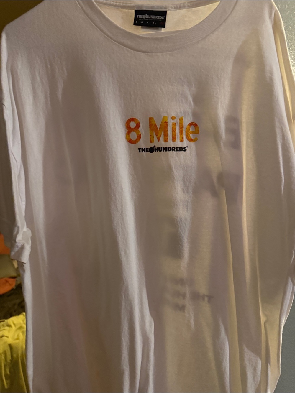 The Hundreds White Tee with Orange-Gold "8 Mile" Graphic
